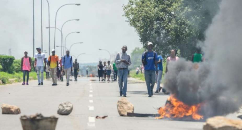 Nationwide protests were triggered by the government announcing that fuel would more than double in price as Zimbabwe's economic crisis deepens.  By ZINYANGE AUNTONY AFPFile