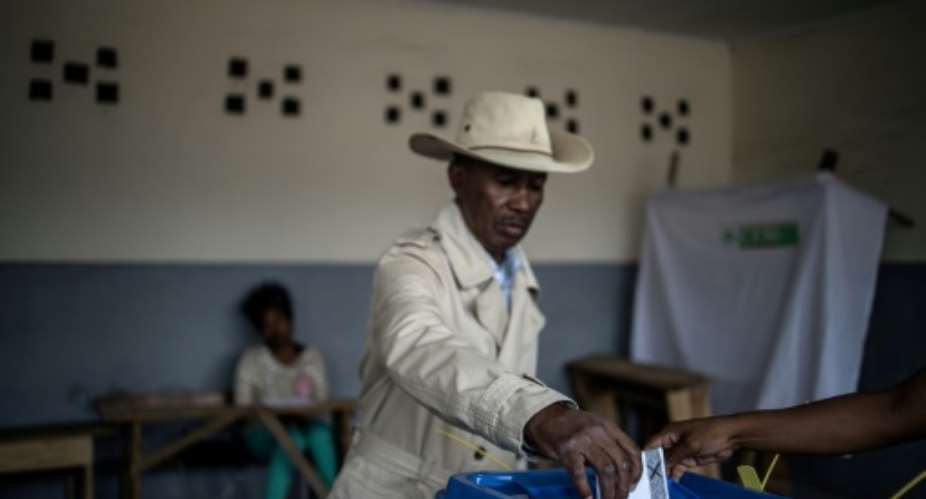 Nearly 10 million voters are eligible to cast ballots for one of 36 candidates.  By Marco LONGARI AFP