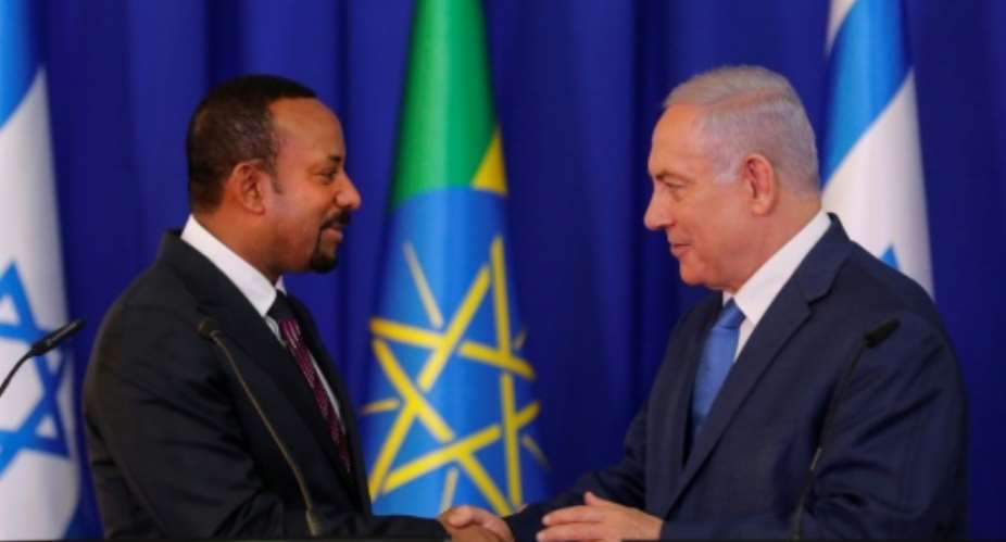 Netanyahu hailed his Ethiopian counterpart Ahmed as 'one of the most important and influential leaders in Africa'.  By MENAHEM KAHANA AFP