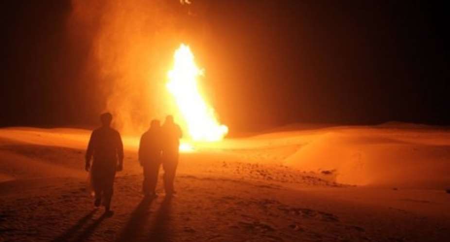 Flames rise from a pipeline that delivers gas to Israel and Jordan in 2011.  By  AFPFile