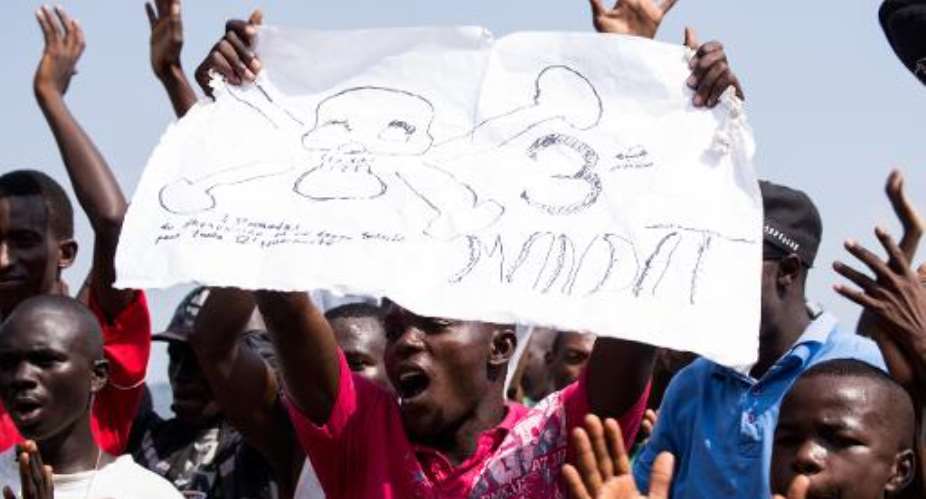 Protesters opposed to Burundian President Pierre Nkurunziza seeking a third term  demonstrate in Musaga, a neighborhood of Bujumbura, on May 29, 2015.  By Landry Nshimiye AFP