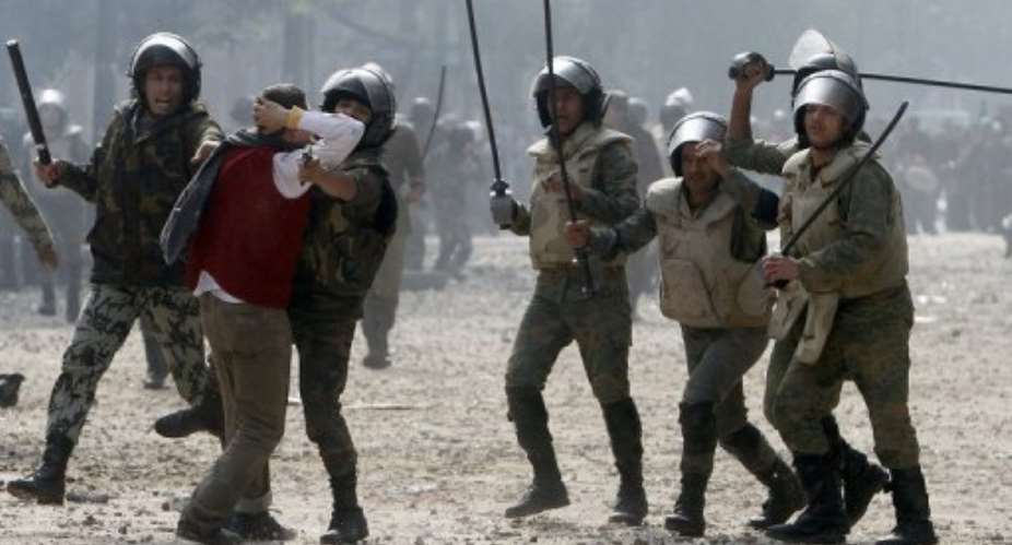 Violence erupted after a protester said he had been arrested by soldiers and beaten up.  By Mohammed Abed AFP