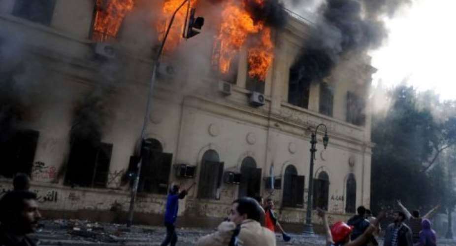 Two government offices caught fire in the latest protests in Cairo.  By Mohammed Hossam AFP