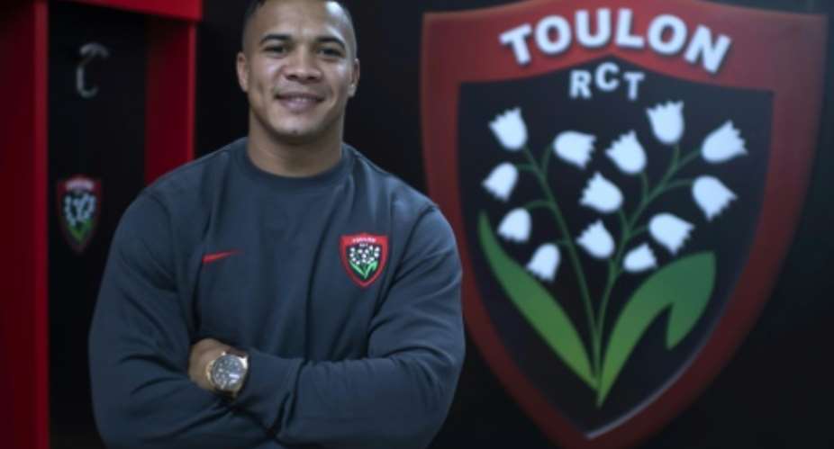 New home: Cheslin Kolbe poses in the Toulon dressing room.  By Christophe SIMON AFP