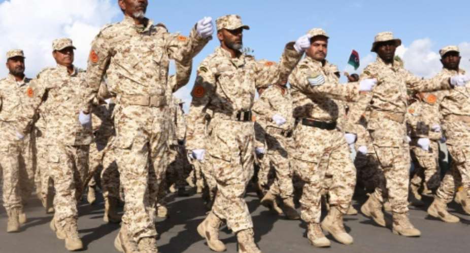 Libyas creation of a Presidential Guard is the first attempt by the new unity government to reorganise armed forces.  By Mahmud Turkia (AFP/File)