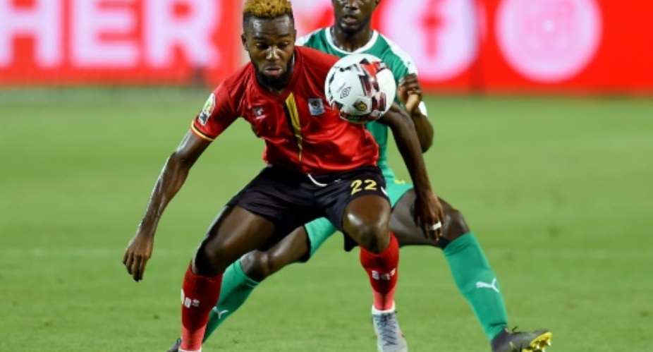 New Pyramids FC signing Lumala Abdu F playing for Uganda against Senegal in the Africa Cup of Nations last month.  By MOHAMED EL-SHAHED AFP
