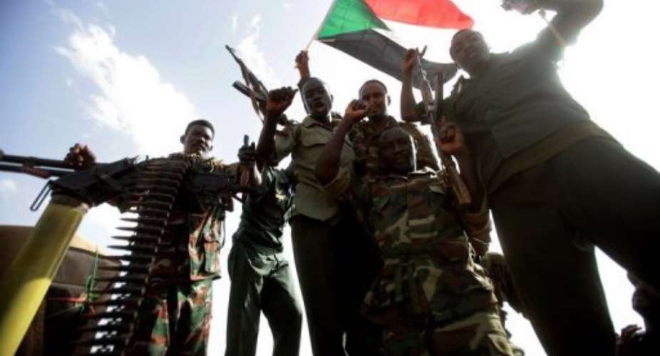 File picture shows Sudanese soldiers in the country's main petroleum centre of Heglig on April 23, 2012.  By Ashraf Shazly AFPFile