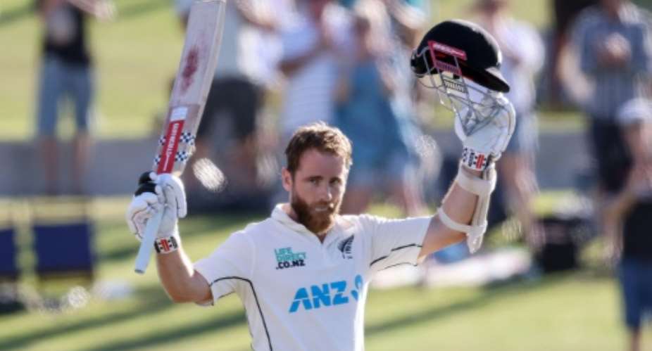 New Zealand's Kane Williamson celebrates his second century of the match against South Africa.  By MICHAEL BRADLEY AFP