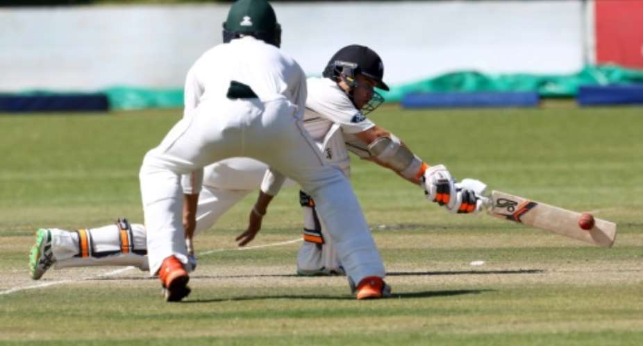 New Zealand's Tom Latham bats during the second day of the first Test against Zimbabwe in Bulawayo on July 29, 2016.  By Jekesai Njikizana AFP
