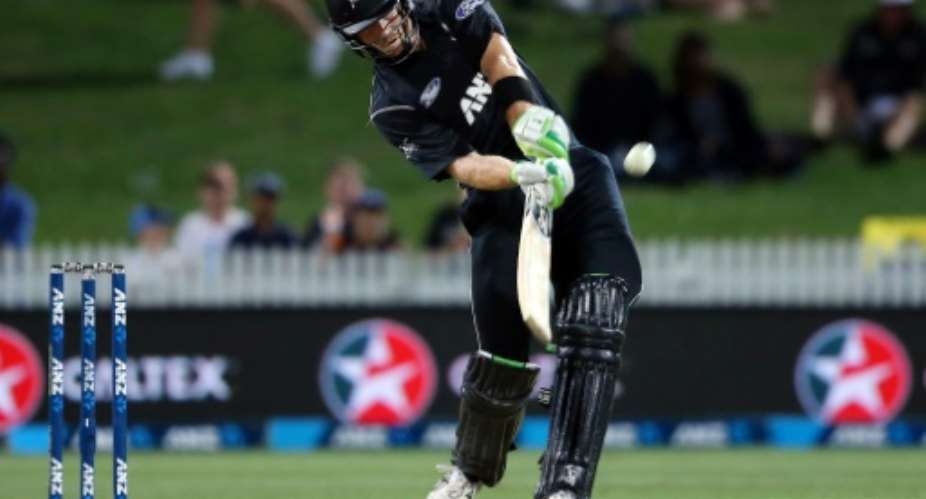 New Zealand's Martin Guptill hits out during the fourth one-day international against South Africa in Hamilton on March 1, 2017.  By MICHAEL BRADLEY AFP