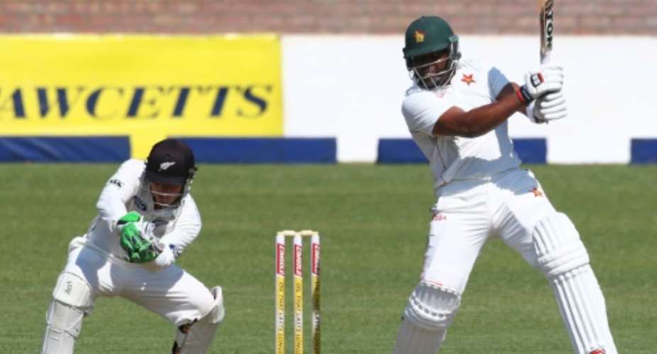 Zimbabwe batsman Hamilton Masakadza bats against New Zealand in the first Test in Bulawayo on July 28, 2016.  By Jekesai Njikizana AFP
