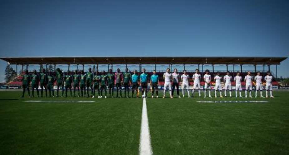 Two teams prior to the CONIFA World Football Cup 2014 match in Oestersund, Sweden, on June 2, 2014.  By Jonathan Nackstrand (AFP/File)