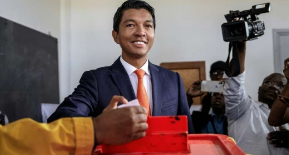 Nicknamed the disc jockey, a moniker he earned from his popularity for promoting parties in the capital Antananarivo, Rajoelina burst onto the political scene 11 years ago.  By GIANLUIGI GUERCIA AFP