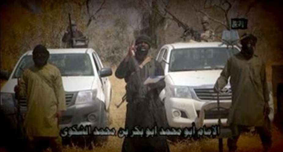 Boko Haram leader Abubakar Shekau C makes a statement in a video posted online on February 9, 2015.  By  Boko HaramAFP