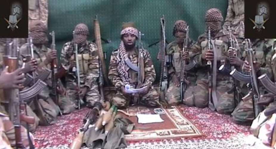 A screengrab taken on September 25, 2013 from a video distributed through an intermediary shows a man claiming to be Abubakar Shekau, leader of Nigerian Islamist extremist group Boko Haram.  By - BOKO HARAMAFP