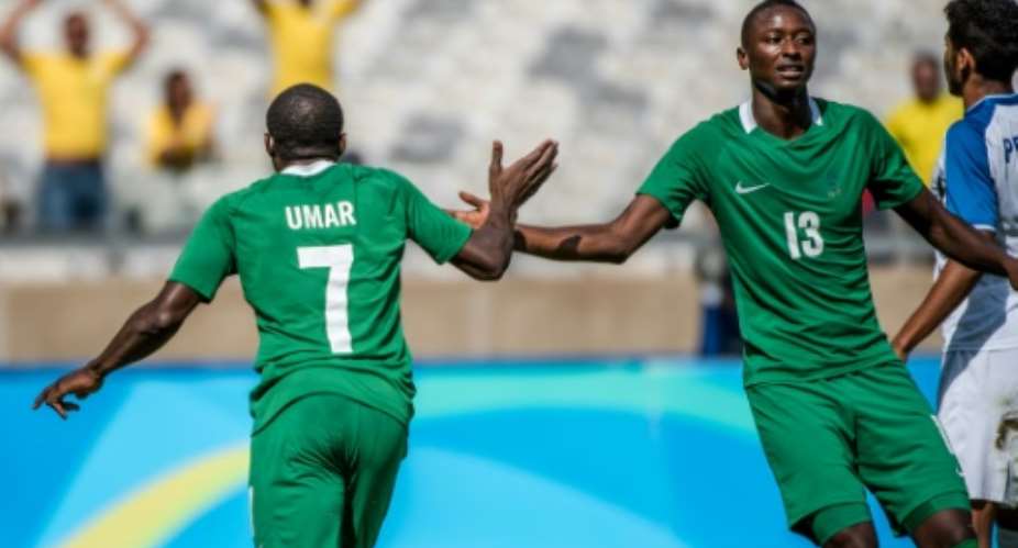Aminu Umar left and Sadiq Umar scored the goals that won the football bronze medal for Nigeria against Honduras.  By Gustavo Andrade AFP