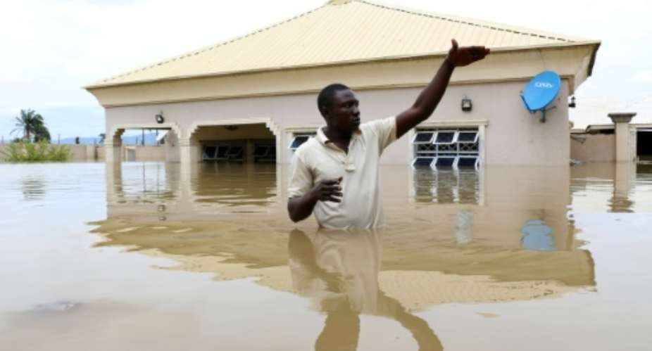 Nigeria has declared a national disaster after severe flooding left about 100 people dead.  By Sodiq ADELAKUN AFP
