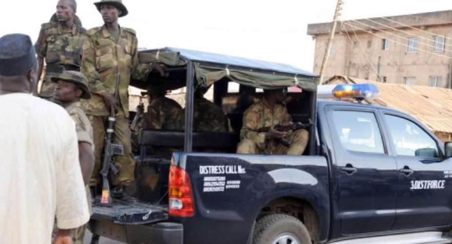 Soldiers patrol the streets in Jos.  By Pius Utomi Ekpei (AFP/File)