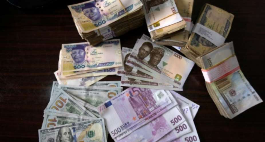 Nigeria is trying to strengthen the naira to give businesses easier access to the foreign currency they need to pay for imported machinery and raw materials.  By PIUS UTOMI EKPEI AFP