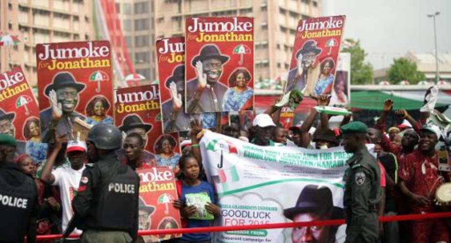 Supporters of the Nigerian President Goodluck Jonathan gather during a ceremony in Abuja on November 11, 2014, the day he declared his bid for re-election.  By Kolawole Oshiyemi AFPFile