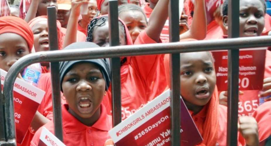 Children designated ambassadors for the Chibok girls protest on April 14, 2015 in the Nigerian capital Abuja, demanding the release of more than 200 schoolgirls abducted by Boko Haram militants.  By - AFPFile