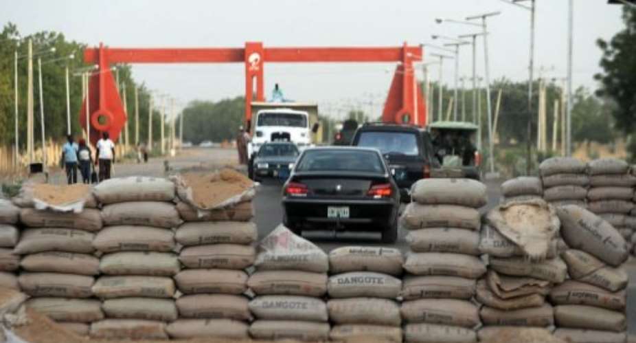 Sandbags are in place at a road block in the northeastern Nigerian town of Maiduguri, Borno State., on April 30, 2013.  By Pius Utomi Ekpei (AFP/File)