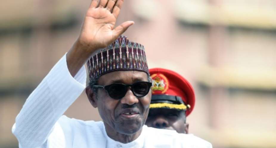 Nigeria said the report scratches the surface of the subject then ends up blaming the government under the able leadership of President Muhammadu Buhari pictured June 2019.  By PIUS UTOMI EKPEI AFPFile