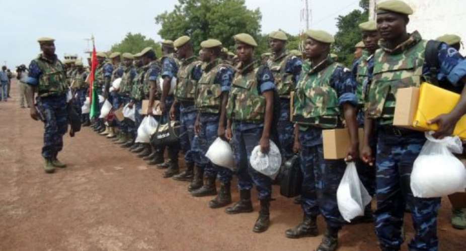 Soldiers from Burkina Faso, part of a west African force in Guinea-Bissau, arrive at Bissau airport.  By Alfa Ba (AFP/File)