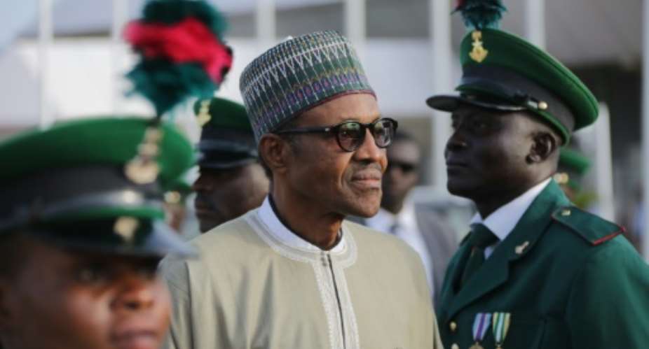 Nigeria's President Muhammadu Buhari, pictured on June 19, 2016, said in a statement that his administration is talking to Niger delta militants through oil companies and law-enforcement agencies.  By Sunday Aghaeze AFPFile