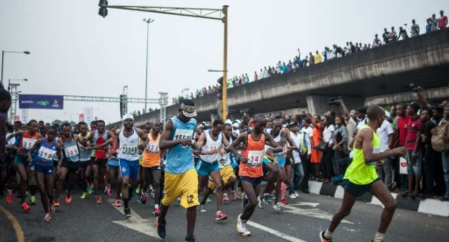 Athletes compete in the first Lagos City Marathon, on February 6, 2016.  By Stefan Heunis AFP