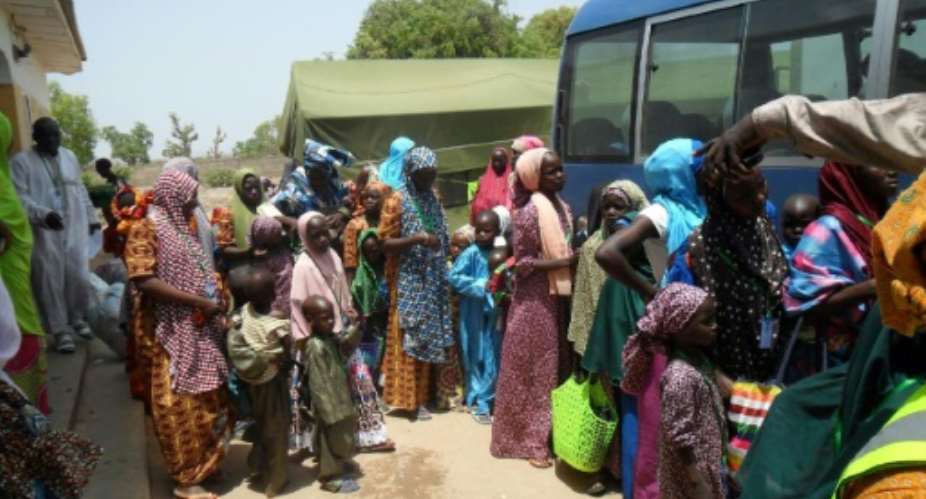 Some of the 275 women and children rescued from Boko Haram during military operations leave the Malkohi camp outside the Adamawa state capital, Yola, in northeast Nigeria, on May 25, 2015.  By Stringer AFPFile