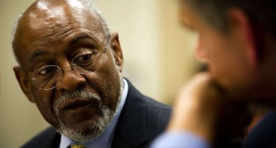 Assistant Secretary of State Bureau of African Affairs Johnnie Carson (L).  By Jim Watson (AFP)