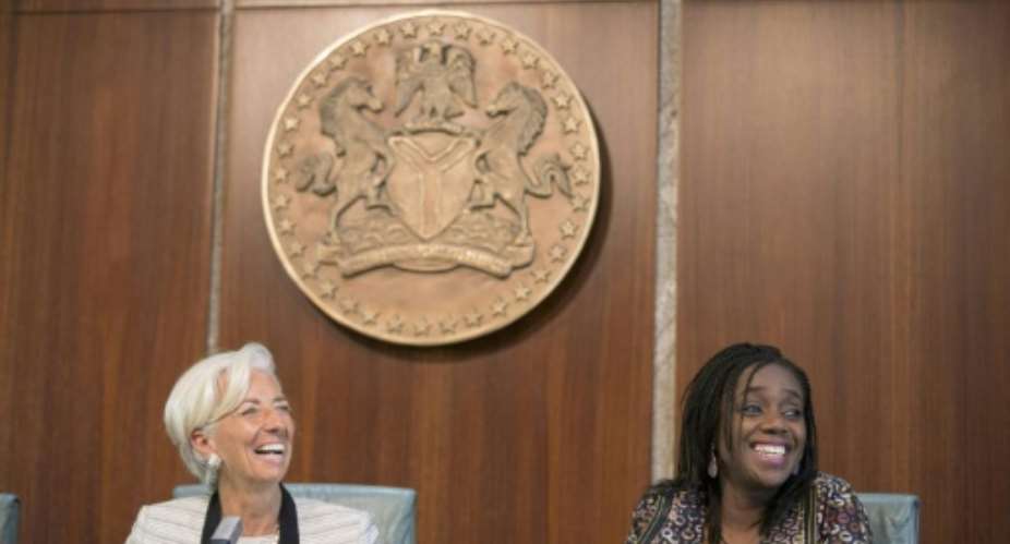 Nigerian finance minister Kemi Adeosun R in better times, with International Monetary Fund chief Christine Lagarde in Abuja in January 2016.  By Stephen Jaffe IMFAFPFile