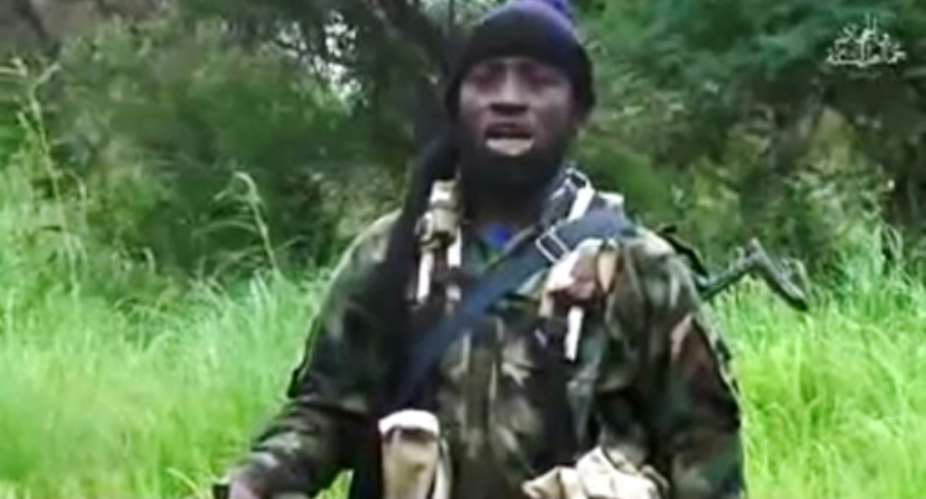 Nigerian Islamist extremist group Boko Haram's shadowy leader Abubakar Shekau has been injured in an air strike, reports said.  By HO, HO, HO BOKO HARAMAFPFile