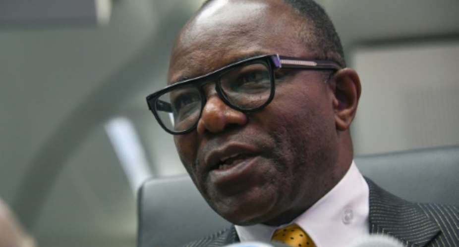 Nigerian Minister of Petroleum Emmanuel Kachikwu, seen in June 2016, said he expects there to be zero oil proudction shutdowns in 2017 as a result of militancy.  By Joe Klamar AFP