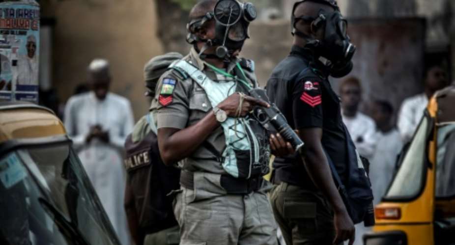 Nigerian police pictured February 2019 were doing