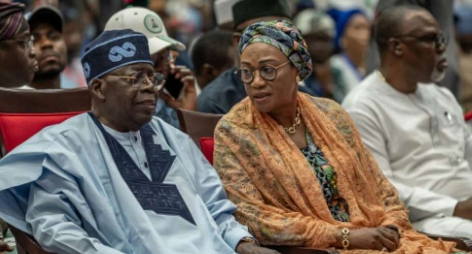 Nigerian President Bola Tinubu (L) has himself been the subject of fabricated content online.  By Light Oriye Tamunotonye (AFP)