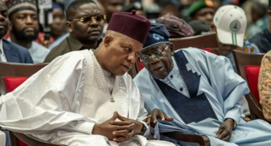 Nigerian President Bola Tinubu (R), seeking re-election, is widely considered the countrys shrewdest political dealmaker.  By Light Oriye Tamunotonye (AFP)