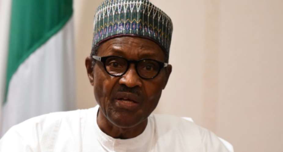 Nigerian President Muhammadu Buhari, pictured August 2018, ordered graft suspects to be placed on watch lists, with members of opposing parties believed to be the targets.  By PIUS UTOMI EKPEI AFPFile