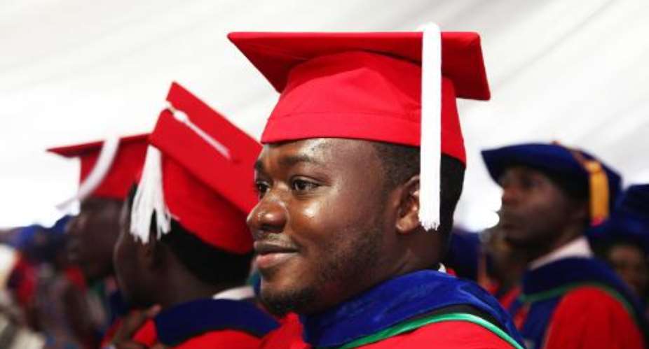 Abubakar Umar looks on during his graduation ceremony at the American University of Nigeria in Yola, Adamawa state, on Saturday May 9, 2015.  By Emmanuel Arewa AFP