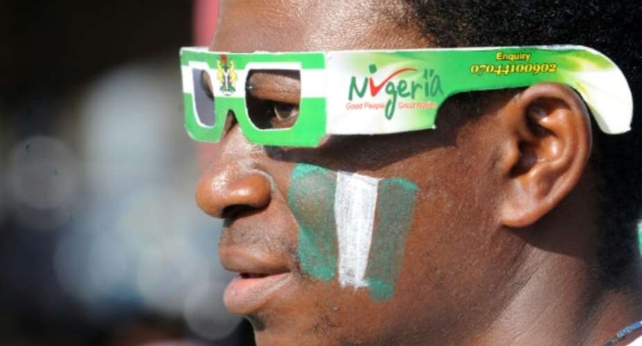 A Nigeria fan in Lagos on June 30, 2014.  By Pius Utomi Ekpei AFPFile