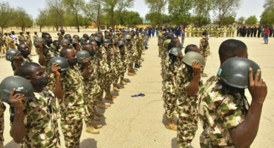 Nigeria's armed forces are struggling with a jihadist insurgency, as well as ethnic unrest and brutal attacks by criminal gangs.  By AUDU MARTE AFPFile