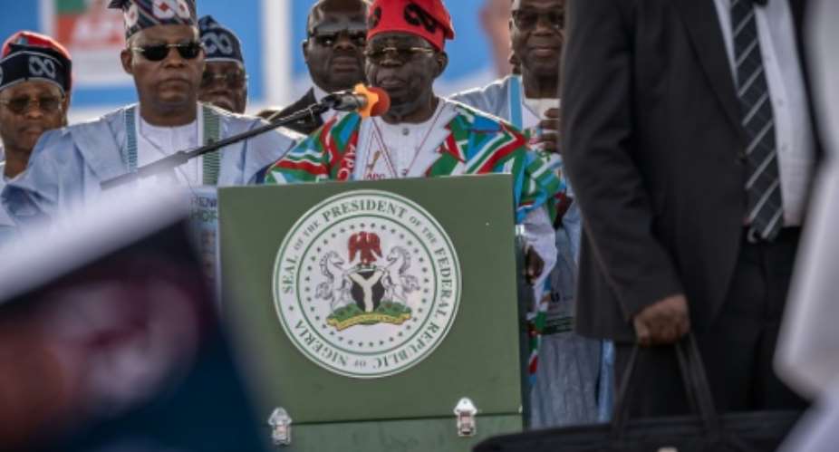 Nigerias President Bola Tinubu is running for re-election amid voter anger over the rising cost of living and violence from armed groups.  By Light Oriye Tamunotonye (AFP)