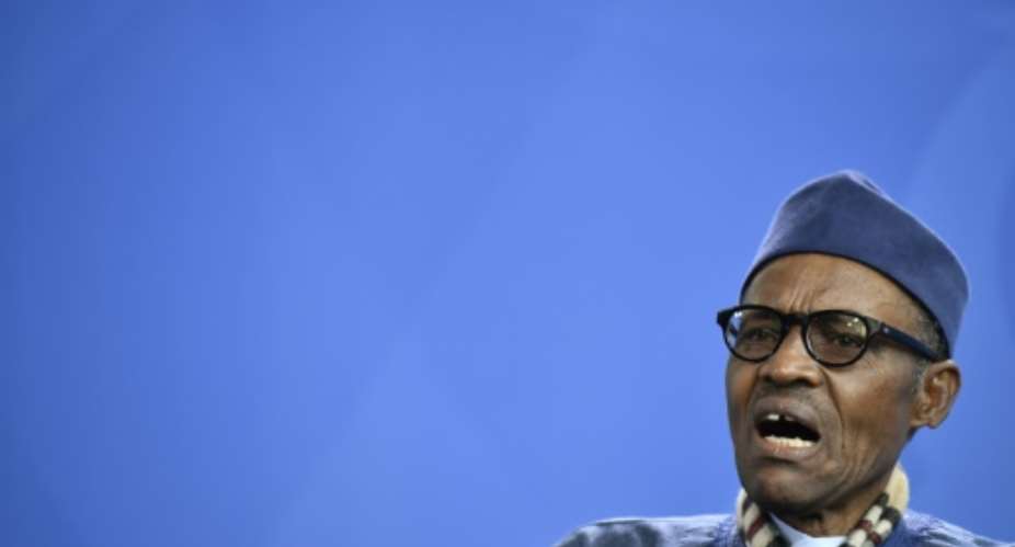 Nigeria's President Muhammadu Buhari gives a press conference in Berlin on October 14, 2016.  By John Macdougall AFPFile