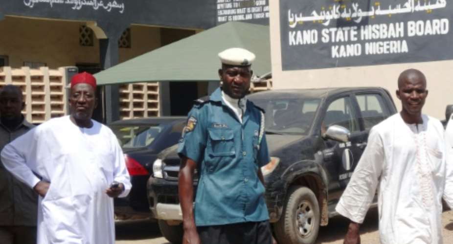 Nigeria's sharia enforcement agency Hisbah, seen here in Kano state, ruled the men had made a mockery of Islam with a false Facebook wedding that caused uproar.  By AMINU ABUBAKAR AFP