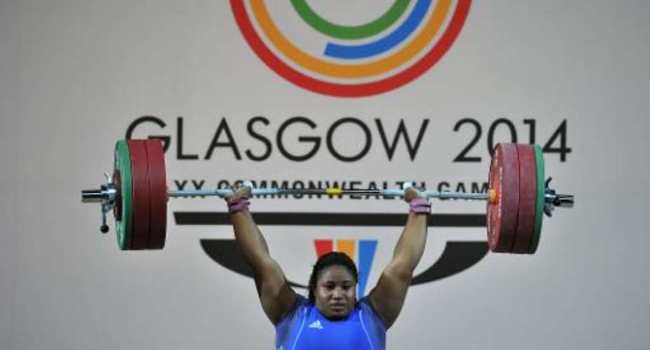 Maryam Usman of Nigeria competes in the Women's +75kg weightlifting final at the SECC Precinct during the 2014 Commonwealth Games in Glasgow on July 30, 2014.  By Glyn Kirk AFP