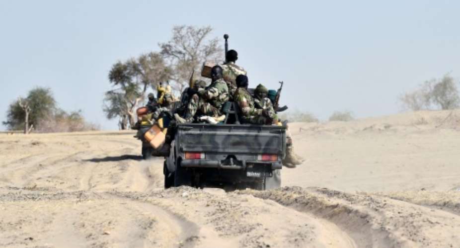 Nigerien soldiers patroling near Bosso, Niger.  By Issouf Sanogo AFPFile