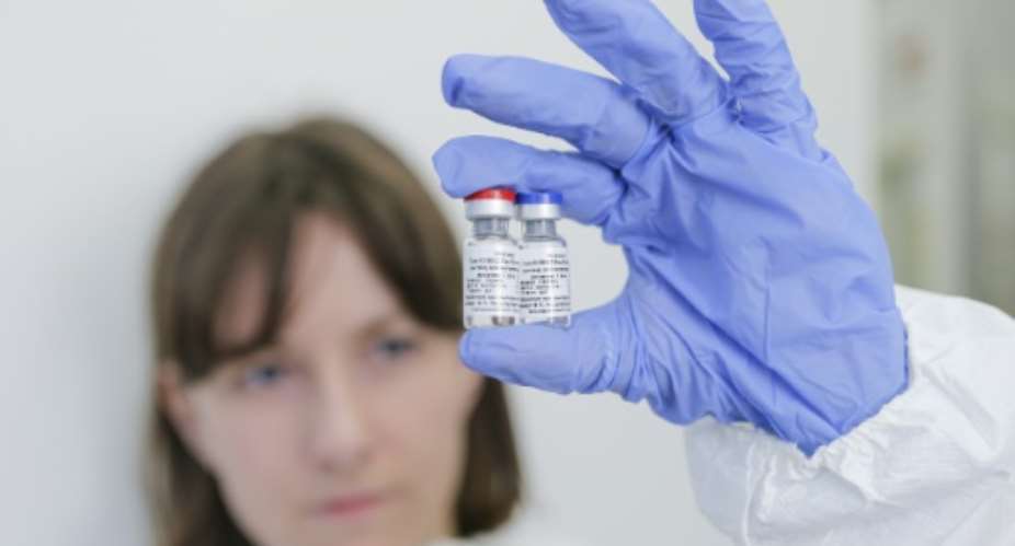 Nine vaccine candidates are in last-stage trials.  By Handout Russian Direct Investment FundAFP