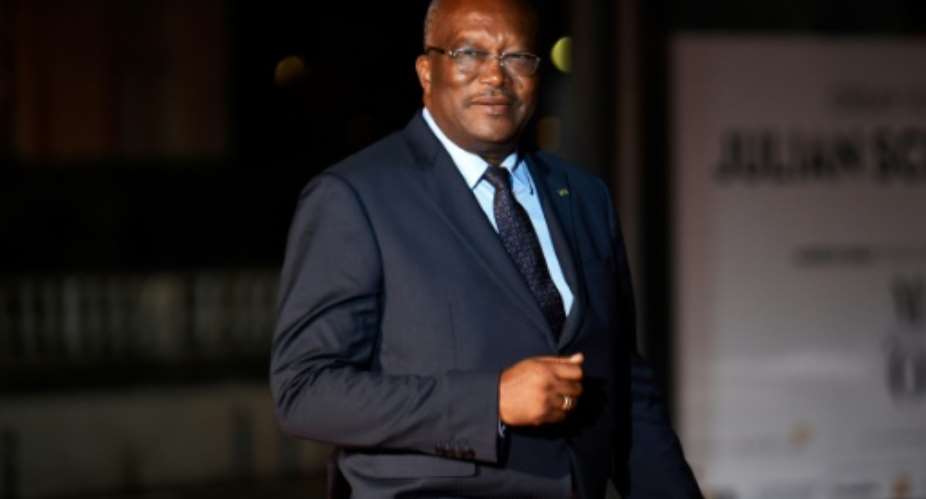 No explanation was given for the resignations of Burkina Faso's government and prime minister, though sources say President Roch Marc Christian Kabore pictured November 2018 wants to breathe new life into the country's leadership.  By Eric FEFERBERG AFPFile