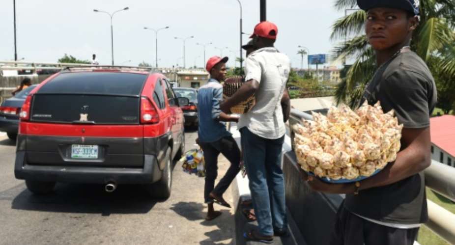 Street hawkers in Lagos now risk up to six months in jail and a fine if they are caught.  By Pius Utomi Ekpei AFPFile